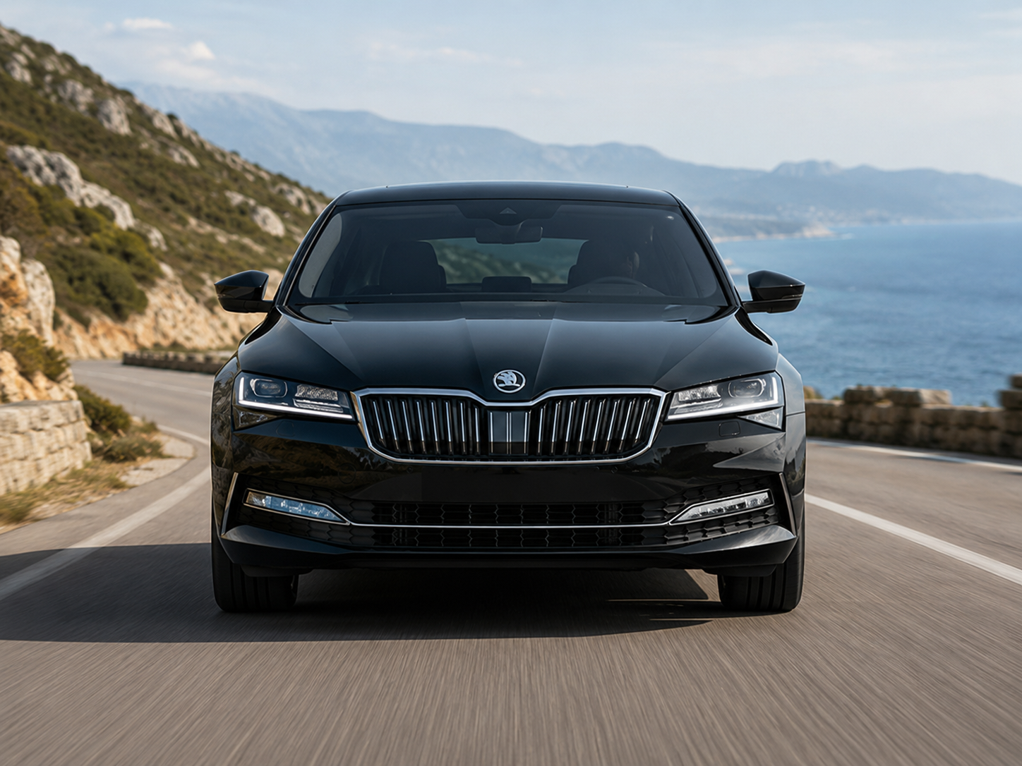 Black Skoda Superb exterior at a premium hotel
